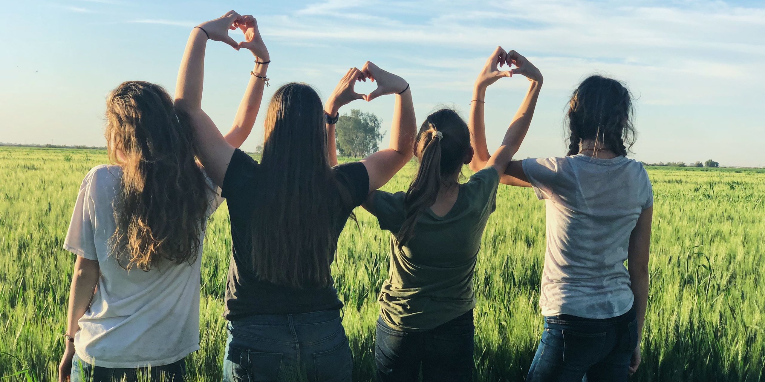 Girls linking arms
