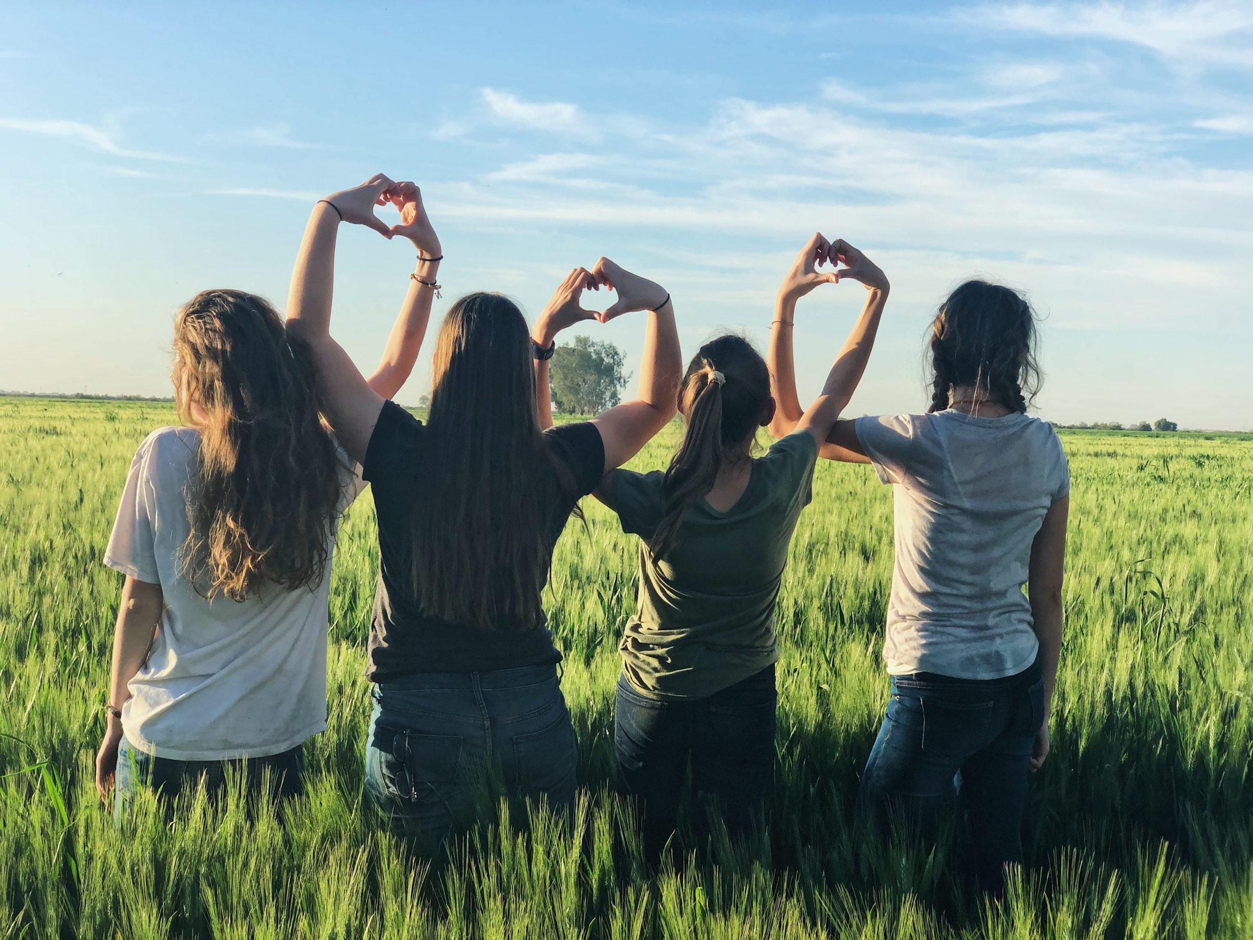 Girls linking arms